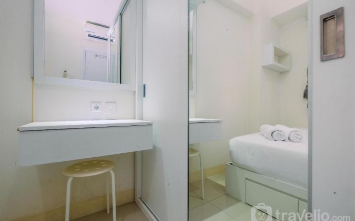 Relaxing 2BR at Green Pramuka Apartment By Travelio
