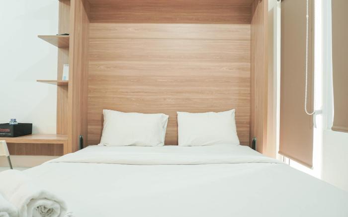 Lovely and Strategic Studio at Green Pramuka Apartment By Travelio