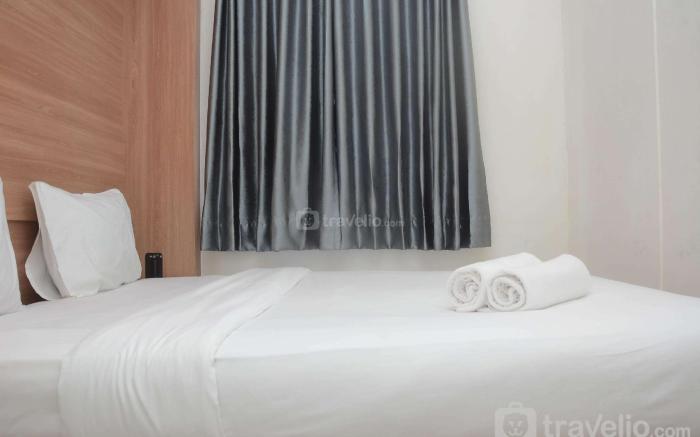 Cozy 2BR Green Pramuka City near Mall By Travelio