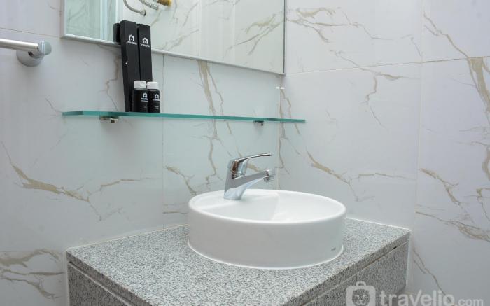 Cozy Living 1BR at Grand Kamala Lagoon By Travelio