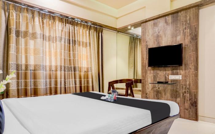 Super Townhouse OAK Regal Inn Near Sant Tukaram Nagar Metro Station