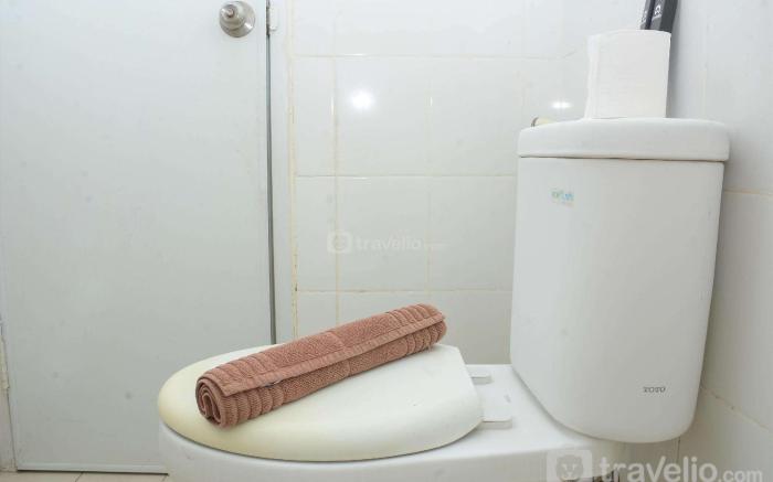Strategic 2BR Bassura City Apartment By Travelio