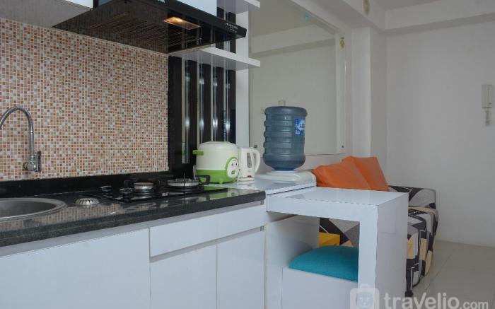 Strategic 2BR Bassura City Apartment By Travelio