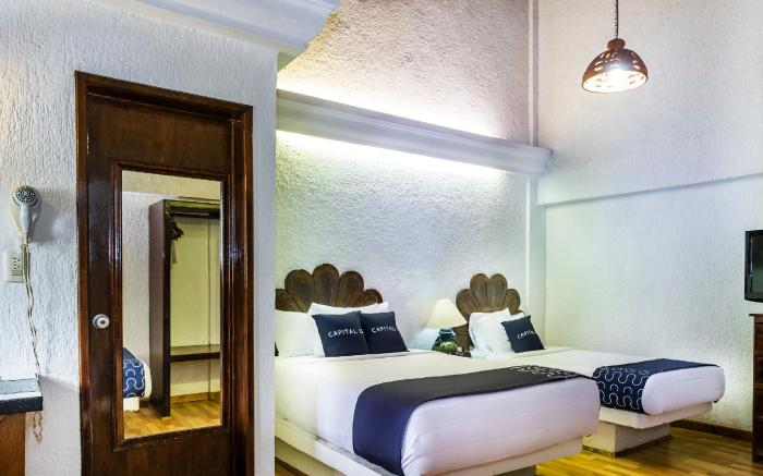 Capital O Hotel Central