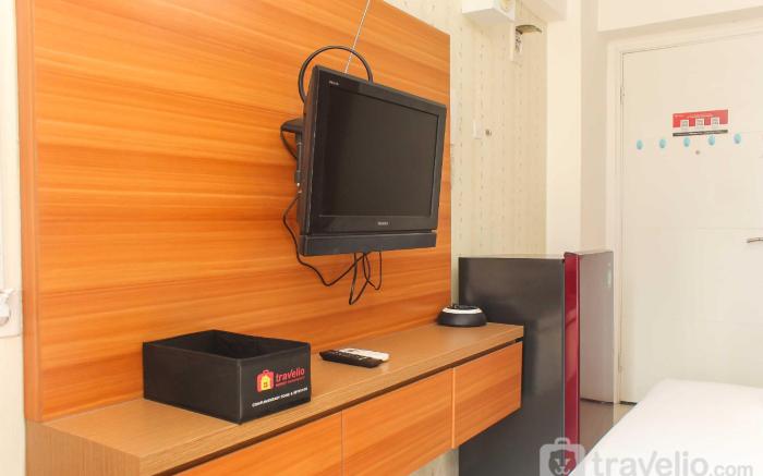 Cozy Studio at Bassura City Apartment By Travelio