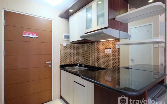 Warm Studio at Taman Melati Margonda By Travelio