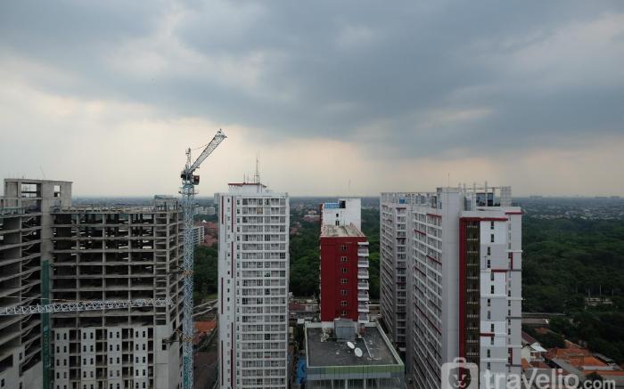 Comfort 1BR at Evenciio Margonda By Travelio