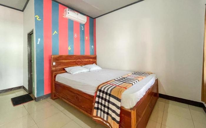 Ekas Beach Guesthouse Mitra RedDoorz