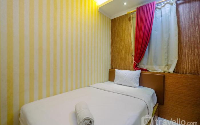 Lush 3BR Apt at Grand Palace Kemayoran By Travelio