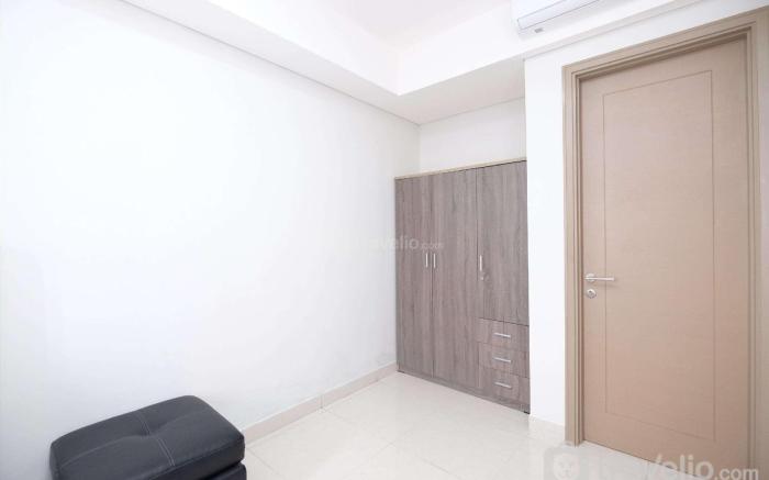 Comfort & Minimalist 2BR at Gold Coast By Travelio