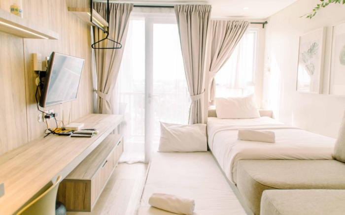 Simple and Cozy Living Studio Poris 88 By Travelio