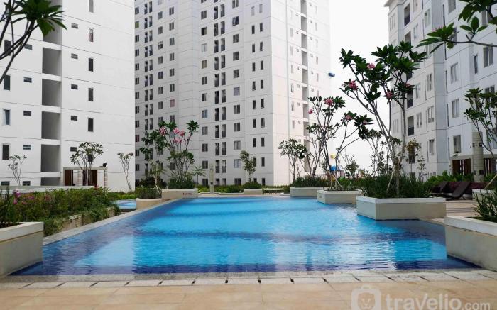 Minimalist and Warm 2BR Bassura City By Travelio