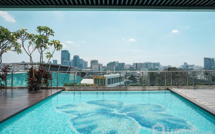 Comfy and Cozy 2BR at Menteng Park By Travelio