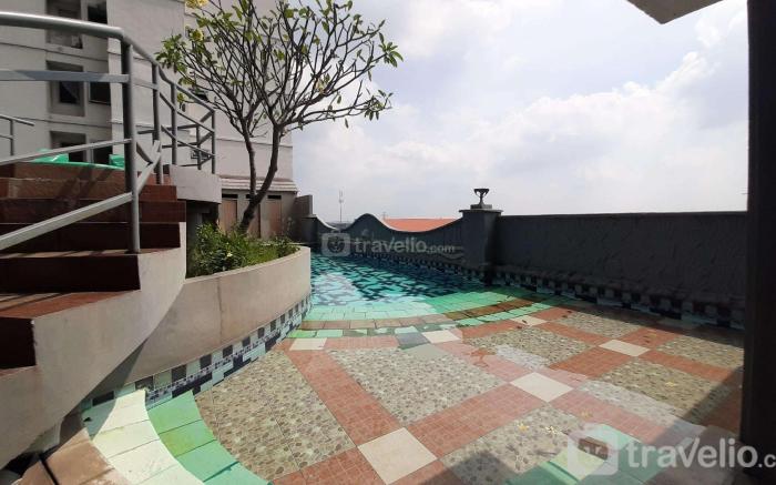 Cozy Pool View 2BR at Great Western By Travelio