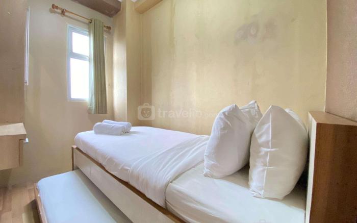 Cozy 2BR Apartment at Suites @ Metro By Travelio