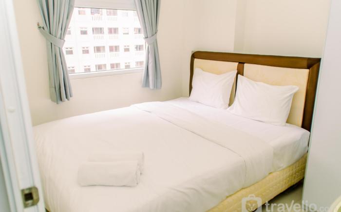 Modern 2BR Green Pramuka City nearMall By Travelio