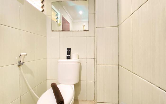 Cozy 2BR @ Gateway Ahmad Yani Cicadas By Travelio