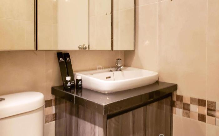 Nice & Cozy Living 2BR Green Bay Pluit By Travelio