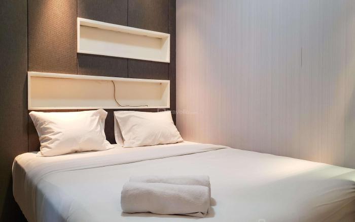 Nice & Cozy Living 2BR Green Bay Pluit By Travelio