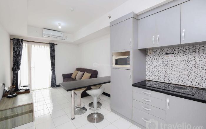 Nice and Elegant 1BR The Wave Kuningan By Travelio