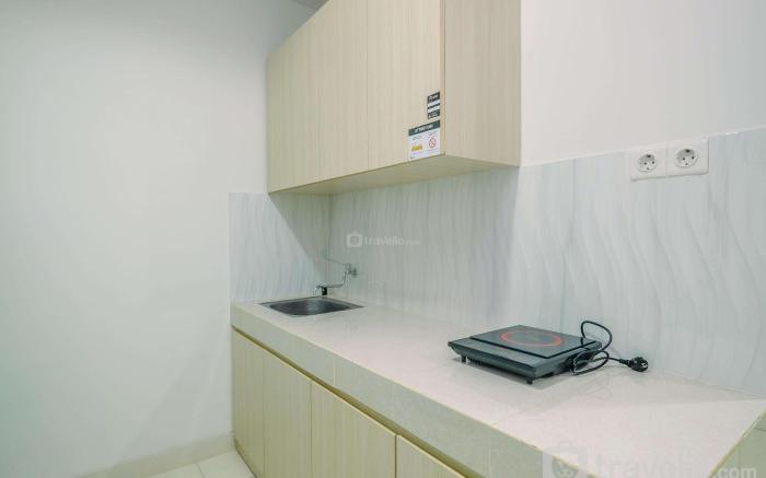 Homey Comfy 2BR at Sentul Tower Apt By Travelio