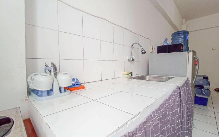 Cozy 2BR at Delta Cakung Apartment By Travelio