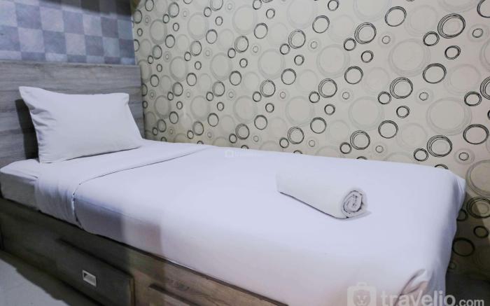 Homey and Cozy 2BR Jarrdin Cihampelas By Travelio
