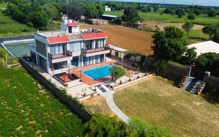 IBIZA FARM BY TRV , A 3BHK VILLA WITH MASSIVE POOL