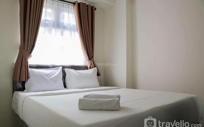 Well Design 2BR at Green Pramuka City By Travelio