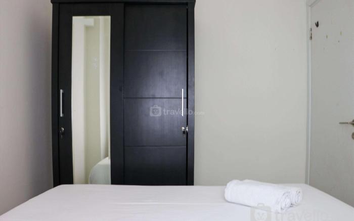 Well Design 2BR at Green Pramuka City By Travelio