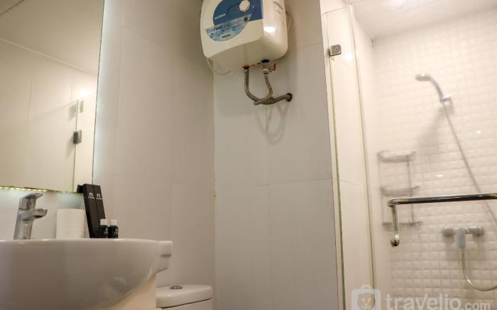 Warm & Minimalist 2BR Green Bay Pluit By Travelio