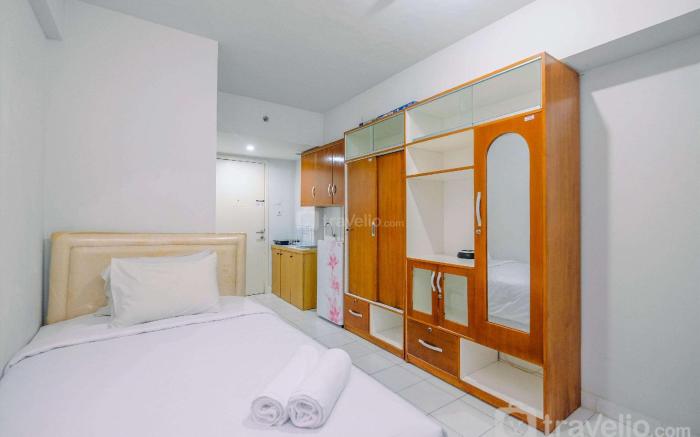Homey and Tidy Studio Dramaga Tower By Travelio