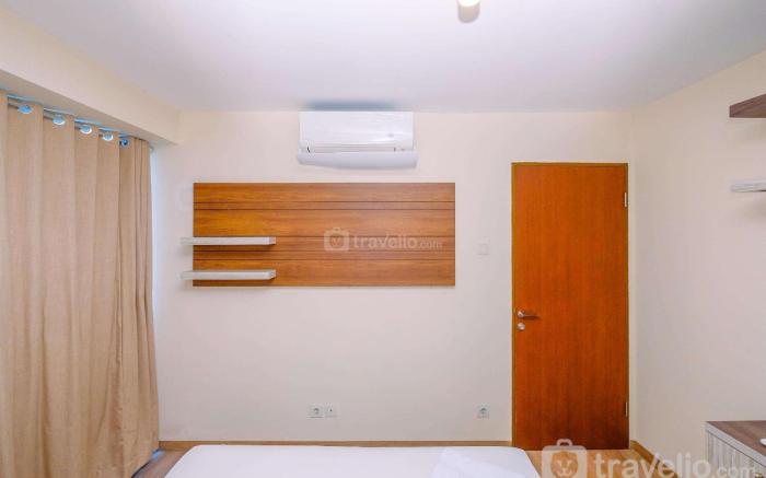 Comfortable and Warm 2BR at Tifolia By Travelio