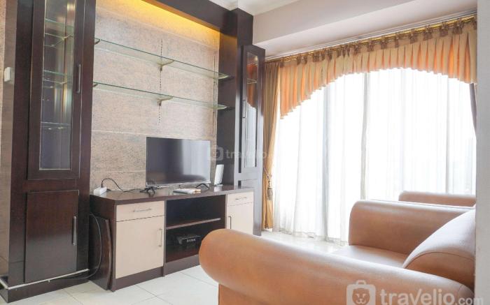 Cozy and Simply Look 2BR Puri Garden By Travelio