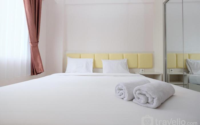 Comfort 2BR Apt at Podomoro Golf View By Travelio