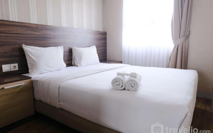 Homey 2BR Mekarwangi Square By Travelio