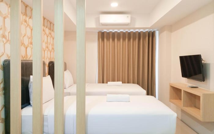 Tranquil Studio at De Prima Apt By Travelio