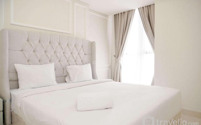Modern Look and Warm 1BR at Gold Coast By Travelio