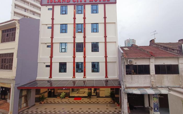 Capital O 90897 Island City Hotel
