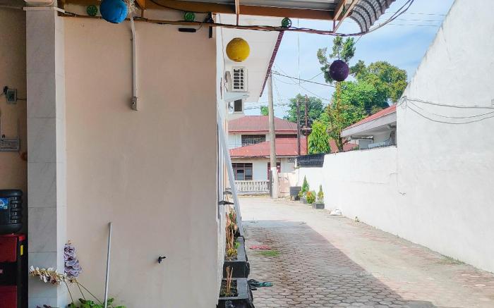 New Era Family Homestay Binjai Mitra RedDoorz