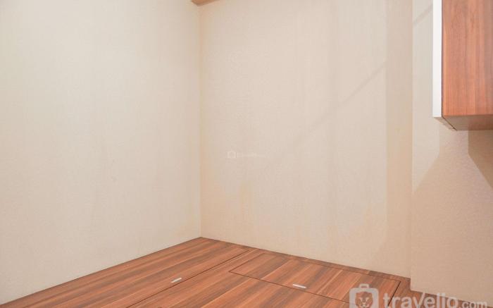 Cozy Stay 1BR at Green Pramuka City By Travelio