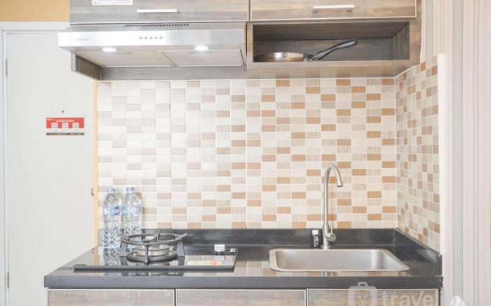 CozyStay Studio Green Pramuka City Apt By Travelio