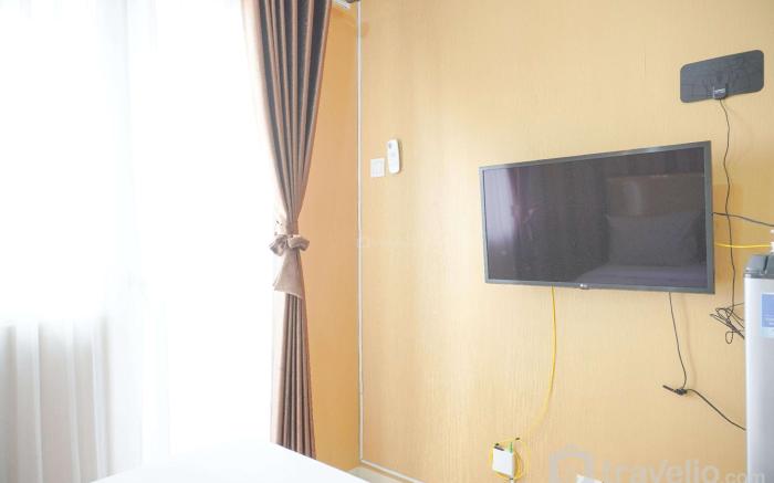 CozyStay Studio Green Pramuka City Apt By Travelio