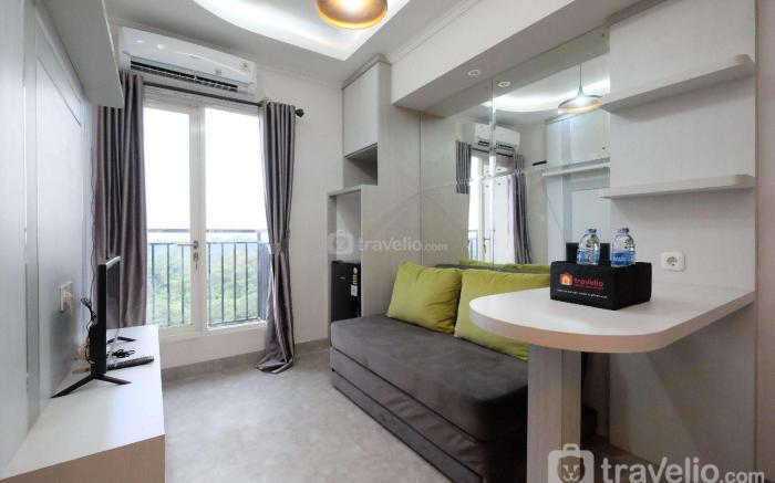 WarmDesigned 2BR at Podomoro Golf View By Travelio