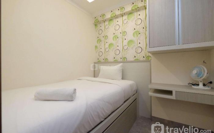 WarmDesigned 2BR at Podomoro Golf View By Travelio