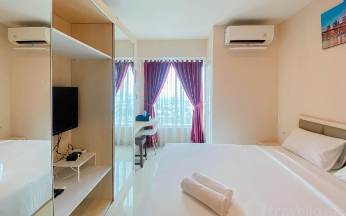 Cozy 1BR Grand Kamala Lagoon Apt By Travelio