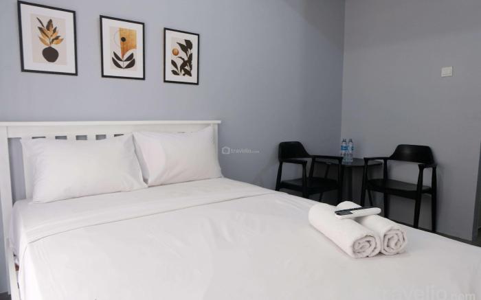 Minimalist Studio Grand Asia Afrika By Travelio