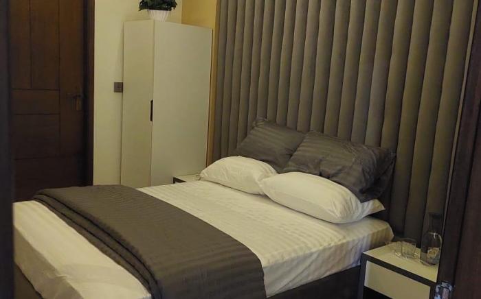 Traveler's Heaven 3BR APT DHA NISHAT PHASE 6
