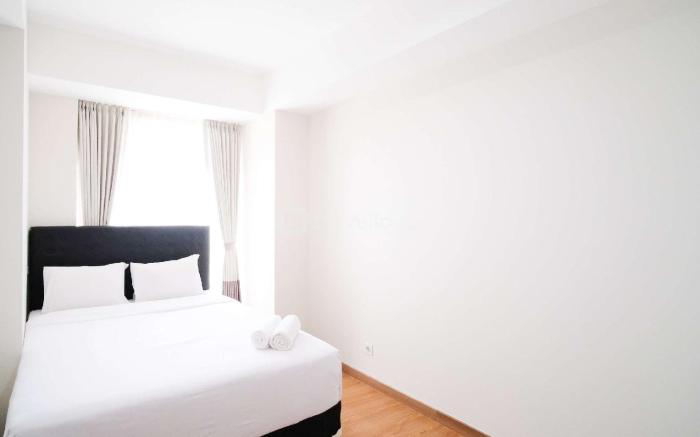 Simple 2BR Grand Sungkono Lagoon Apt By Travelio
