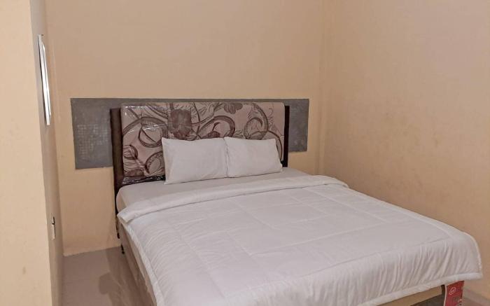OYO 93590 Penginapan Palapa 10 Syariah